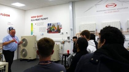 Students listen to a training session at Grant UK training academy