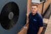 Tom Coverdale of Ebac stands by a heat pump