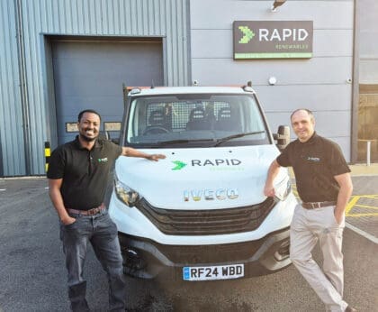 Rapid Renewables team standing by a car