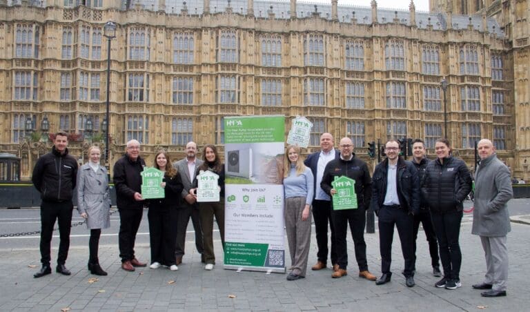 A group of people from the Heat Pump Association and its members pictured outside the Houses of Parliament.