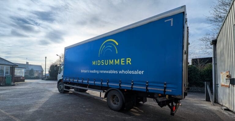 A Midsummer delivery vehicle leaves the warehouse.